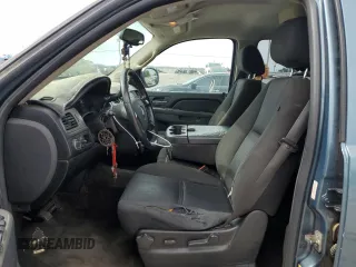2010 Chevrolet Tahoe LS with VIN 1GNUCAE00AR103589, listed as a Copart auction lot 60621345 with 214,922 mi miles and Salvage title. Bid and sale history available at DreamBid. Image 7.