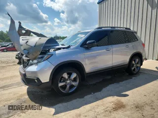 2020 Honda Passport Touring с VIN 5FNYF8H9XLB019275, выставлен на аукционе Copart как лот 63085665 с пробегом 54 081 миль миль и Списание • Salvage title. История ставок и продаж доступна на DreamBid. Изображение 1.