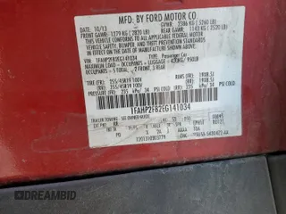 2014 Ford Taurus Limited z VIN 1FAHP2F82EG141034, wystawiony jako Copart lot #52579995 z przebiegiem 207 709 mil mil oraz Szkoda całkowita • Salvage title. Historia ofert i sprzedaży dostępna na DreamBid. Obrazek 15.