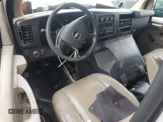 2013 Chevrolet Express Cargo z VIN 1GCSGAFX1D1133445, wystawiony jako Copart lot #56879675 z przebiegiem 201 501 mil mil oraz Tytuł czysty. Historia ofert i sprzedaży dostępna na DreamBid. Obrazek 8.