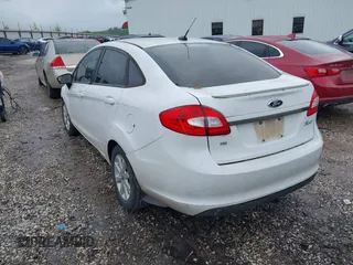 2012 Ford Fiesta SE with VIN 3FADP4BJ0CM220742, listed as a IAAI auction lot 42207303 with 175,875 mi miles and . Bid and sale history available at DreamBid. Image 3.