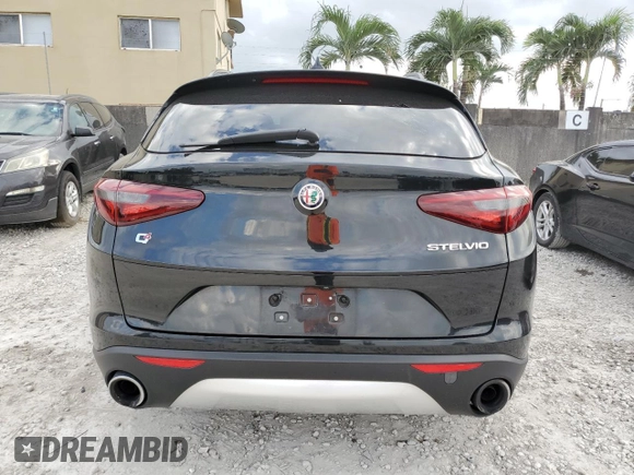 2018 Alfa Romeo Stelvio Sport z VIN ZASFAKPN8J7B79599, wystawiony jako Copart lot #57396135 z przebiegiem 73 873 mil mil oraz Nie do naprawy. Historia ofert i sprzedaży dostępna na DreamBid. Obrazek 6.