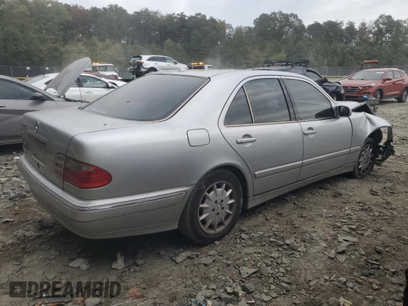 2001 Mercedes-Benz E-Class with VIN WDBJF65J71B201020, listed as a Copart auction lot 76067154 with 328,629 mi miles and Salvage Title. Bid and sale history available at carsss.com. Image 3.