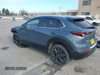 2023 Mazda CX-30 S Carbon Edition with VIN 3MVDMBCM7PM589019, listed as a IAAI auction lot 41251168 with 23,847 mi miles and . Bid and sale history available at DreamBid. Image 3.