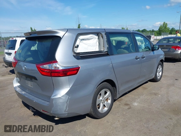 2015 Toyota Sienna L with VIN 5TDZK3DCXFS594786, listed as a IAAI auction lot 42292618 with 180,119 mi miles and . Bid and sale history available at DreamBid. Image 4.