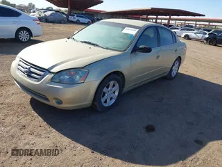 2002 Nissan Altima S with VIN 1N4AL11D72C156191, listed as a IAAI auction lot 41611480 with 135,716 mi miles. Bid and sale history available at carsss.com. Image 2.