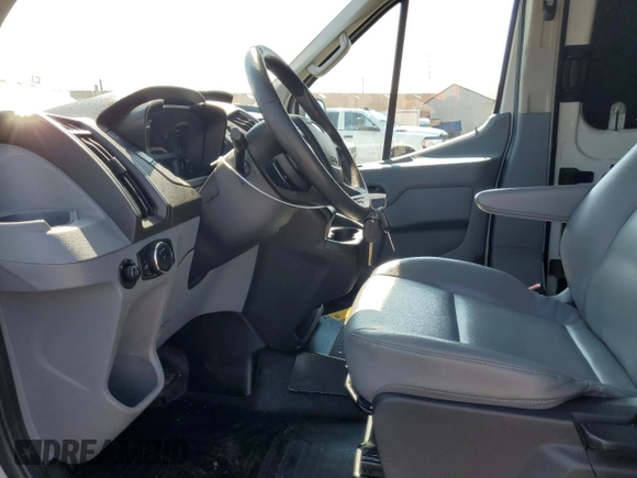 2015 Ford Transit with VIN 1FTNR3XVXFKA81374, listed as a Copart auction lot 63005155 with 512,407 mi miles and Clean title. Bid and sale history available at DreamBid. Image 7.