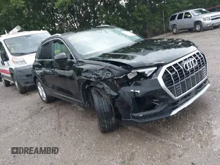 2019 Audi Q3 Premium with VIN WA1AECF34K1077471, listed as a IAAI auction lot 42658213 with 125,889 mi miles and . Bid and sale history available at DreamBid. Image 1.