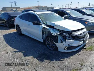 2020 Honda Civic EX-L with VIN 19XFC1F70LE203137, listed as a IAAI auction lot 42028424 with 87,011 mi miles and . Bid and sale history available at DreamBid. Image 1.