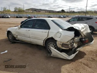 1998 Acura RL Premium z VIN JH4KA9657WC008762, wystawiony jako Copart lot #52979915 z przebiegiem 144 954 mil mil oraz Szkody całkowita. Historia ofert i sprzedaży dostępna na DreamBid. Obrazek 2.