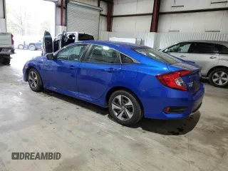 2020 Honda Civic LX with VIN 19XFC2F62LE024577, listed as a Copart auction lot 50799335 with 27,215 mi miles and Salvage Title. Bid and sale history available at DreamBid. Image 2.