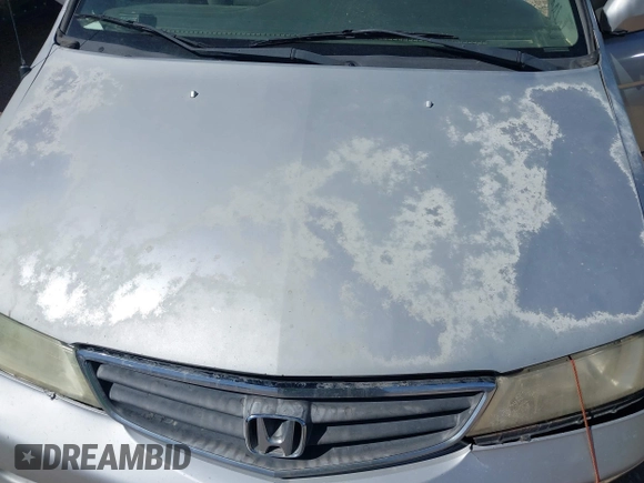 2004 Honda Odyssey EX-L with VIN 5FNRL18904B080009, listed as a IAAI auction lot 41736651 with 461,326 mi miles and . Bid and sale history available at DreamBid. Image 10.