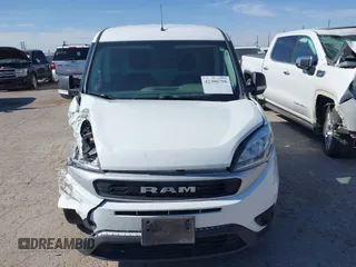 2022 Ram ProMaster City Cargo Tradesman z VIN ZFBHRFAB7N6Y29442, wystawiony jako IAAI lot #42306750 z przebiegiem 89 057 mil mil oraz . Historia ofert i sprzedaży dostępna na DreamBid. Obrazek 12.