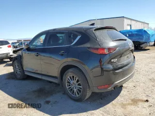 2017 Mazda CX-5 Touring z VIN JM3KFBCL4H0184922, wystawiony jako Copart lot #50166195 z przebiegiem 86 270 mil mil oraz Szkoda całkowita • Salvage title. Historia ofert i sprzedaży dostępna na DreamBid. Obrazek 2.