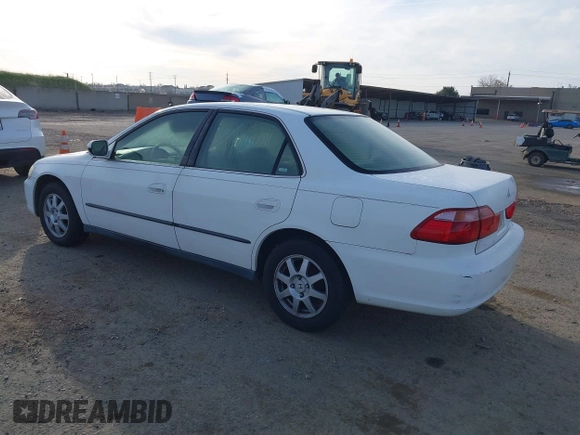 1999 Honda Accord LX with VIN JHMCG665XXC014090, listed as a IAAI auction lot 41765749 with 231,682 mi miles and . Bid and sale history available at DreamBid. Image 3.