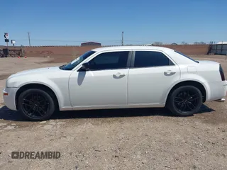 2009 Chrysler 300 Touring with VIN 2C3KA53V89H634048, listed as a IAAI auction lot 41974629 with Not Provided miles and . Bid and sale history available at DreamBid. Image 14.