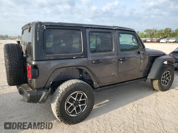 2024 Jeep Wrangler Rubicon z VIN 1C4PJXFG6RW261748, wystawiony jako Copart lot #51479585 z przebiegiem 7 911 mil mil oraz Szkoda całkowita • Salvage title. Historia ofert i sprzedaży dostępna na DreamBid. Obrazek 3.