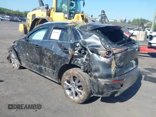 2023 Mazda CX-30 S Carbon Edition with VIN 3MVDMBCM6PM510231, listed as a IAAI auction lot 42579591 with 29,240 mi miles and . Bid and sale history available at DreamBid. Image 3.