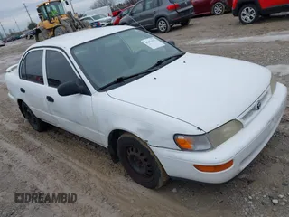 1997 Toyota Corolla with VIN 2T1BA02E9VC195852, listed as a IAAI auction lot 41471633 with 102,400 mi miles and . Bid and sale history available at DreamBid. Image 1.
