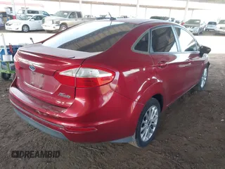 2014 Ford Fiesta SE with VIN 3FADP4BJ1EM111984, listed as a IAAI auction lot 41928387 with 109,641 mi miles. Bid and sale history available at carsss.com. Image 4.