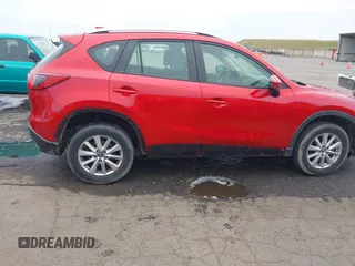 2015 Mazda CX-5 Sport z VIN JM3KE2BE9F0452625, wystawiony jako IAAI lot #42114867 z przebiegiem 167 849 mil mil oraz . Historia ofert i sprzedaży dostępna na DreamBid. Obrazek 6.