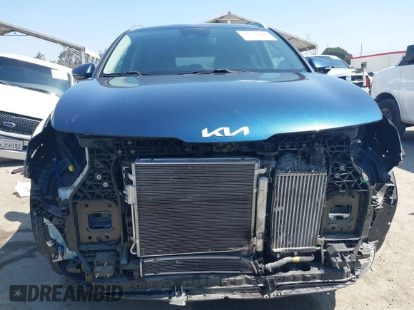 2023 Kia Sportage EX with VIN KNDPVCAG4P7018273, listed as a IAAI auction lot 42374790 with 25,814 mi miles and . Bid and sale history available at DreamBid. Image 13.