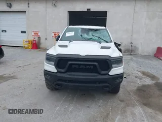 2022 Ram 1500 Rebel z VIN 1C6SRFLT1NN267513, wystawiony jako IAAI lot #41961821 z przebiegiem 140 488 mil mil oraz . Historia ofert i sprzedaży dostępna na DreamBid. Obrazek 13.