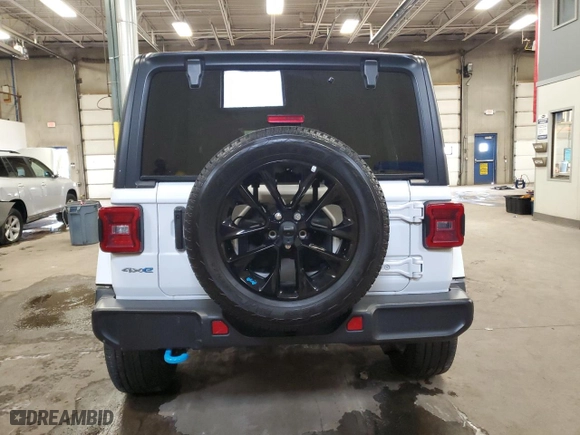2022 Jeep Wrangler 4xe Unlimited Sahara with VIN 1C4JJXP65NW272312, listed as a Copart auction lot 45154875 with 28,263 mi miles and Salvage Title. Bid and sale history available at carsss.com. Image 6.