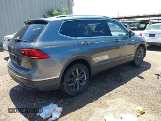 2023 Volkswagen Tiguan SE with VIN 3VVMB7AX4PM023080, listed as a IAAI auction lot 41963195 with 37,696 mi miles and . Bid and sale history available at DreamBid. Image 4.