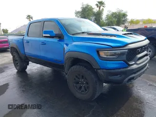 2021 Ram 1500 TRX with VIN 1C6SRFU94MN705006, listed as a IAAI auction lot 42168034 with 44,288 mi miles and . Bid and sale history available at DreamBid. Image 1.