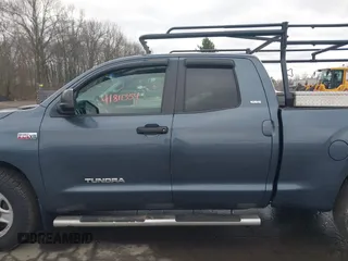 2008 Toyota Tundra z VIN 5TBBV54108S500025, wystawiony jako IAAI lot #41811354 z przebiegiem 131 142 mil mil oraz . Historia ofert i sprzedaży dostępna na DreamBid. Obrazek 14.