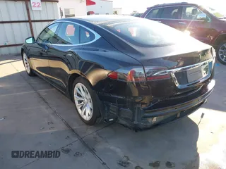 2017 Tesla Model S 60 with VIN 5YJSA1E19HF226094, listed as a IAAI auction lot 40931307 with 80,392 mi miles and . Bid and sale history available at DreamBid. Image 3.