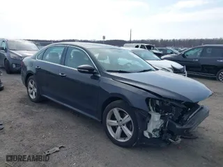 2012 Volkswagen Passat SE with VIN 1VWBP7A37CC021336, listed as a IAAI auction lot 41724459 with 124,832 mi miles. Bid and sale history available at carsss.com. Image 1.