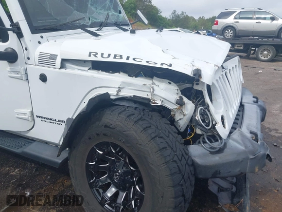 2016 Jeep Wrangler Unlimited Rubicon Hard Rock with VIN 1C4BJWFG3GL228449, listed as a IAAI auction lot 42158318 with Not provided miles and . Bid and sale history available at DreamBid. Image 14.
