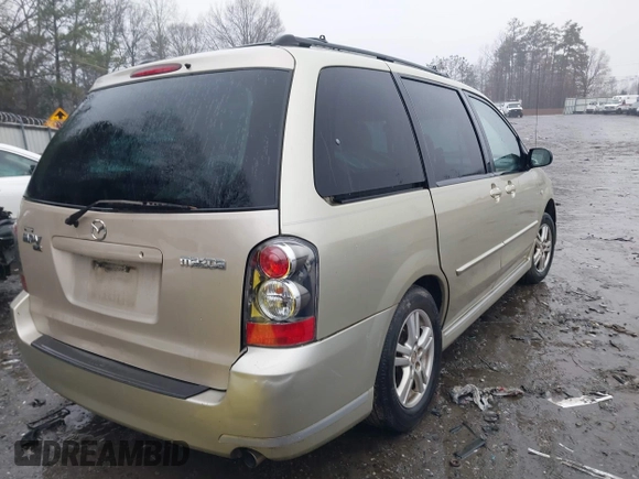 2005 Mazda MPV LX with VIN JM3LW28J650536535, listed as a IAAI auction lot 41569472 with 327,590 mi miles. Bid and sale history available at carsss.com. Image 4.