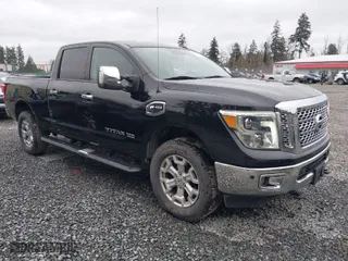 2016 Nissan Titan XD Platinum Reserve with VIN 1N6BA1F2XGN502660, listed as a IAAI auction lot 41731577 with 118,581 mi miles. Bid and sale history available at carsss.com. Image 1.