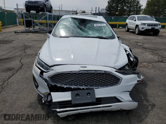 2020 Ford Fusion Titanium z VIN 3FA6P0D96LR205475, wystawiony jako Copart lot #56313075 z przebiegiem 30 888 mil mil oraz Szkoda całkowita • Salvage title. Historia ofert i sprzedaży dostępna na DreamBid. Obrazek 5.