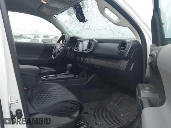 2023 Toyota Tacoma SR with VIN 3TYRX5GN7PT075078, listed as a IAAI auction lot 42421462 with 35,255 mi miles and . Bid and sale history available at DreamBid. Image 5.