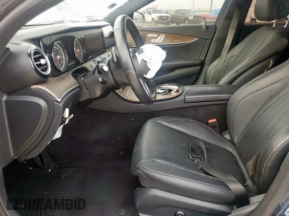 2019 Mercedes-Benz E 300 with VIN WDDZF4JB2KA618999, listed as a Copart auction lot 56915465 with 64,077 mi miles and Salvage title. Bid and sale history available at DreamBid. Image 7.
