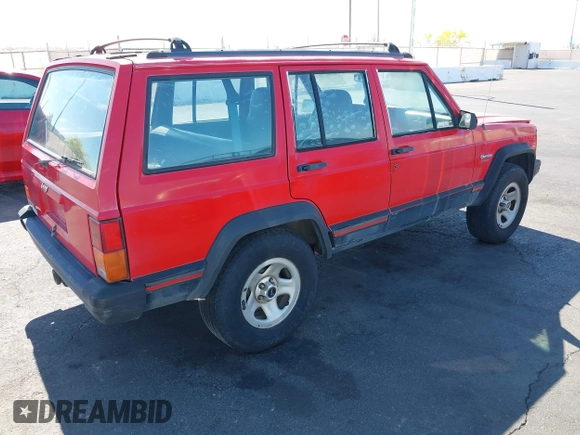 1996 Jeep Cherokee Sport with VIN 1J4FT68S0TL225719, listed as a IAAI auction lot 42121351 with 237,602 mi miles and . Bid and sale history available at DreamBid. Image 4.