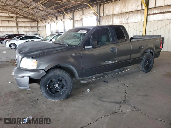 2005 Ford F-150 STX with VIN 1FTRX12W25NA37703, listed as a Copart auction lot 60089325 with 128,651 mi miles and Salvage title. Bid and sale history available at DreamBid. Image 1.