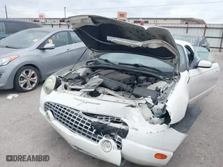 2002 Ford Thunderbird w/Hardtop Premium with VIN 1FAHP60A62Y127579, listed as a IAAI auction lot 42035019 with 98,582 mi miles. Bid and sale history available at carsss.com. Image 6.