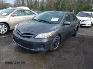 2011 Toyota Corolla L with VIN JTDBU4EE9B9135288, listed as a IAAI auction lot 41933259 with 146,039 mi miles. Bid and sale history available at carsss.com. Image 17.