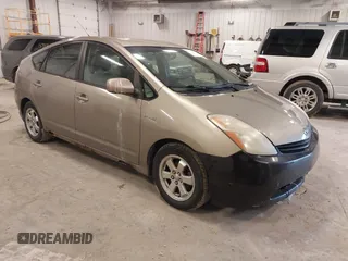2006 Toyota Prius z VIN JTDKB20UX67527545, wystawiony jako IAAI lot #42318045 z przebiegiem 212 911 mil mil oraz . Historia ofert i sprzedaży dostępna na DreamBid. Obrazek 1.