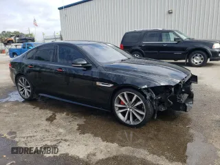 2016 Jaguar XF S with VIN SAJBG4BV2GCY04993, listed as a Copart auction lot 51100865 with 92,410 mi miles and Salvage Title. Bid and sale history available at DreamBid. Image 4.