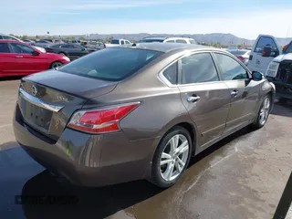 2014 Nissan Altima SL with VIN 1N4BL3AP9EC284477, listed as a IAAI auction lot 41403427 with 100,437 mi miles and . Bid and sale history available at DreamBid. Image 4.