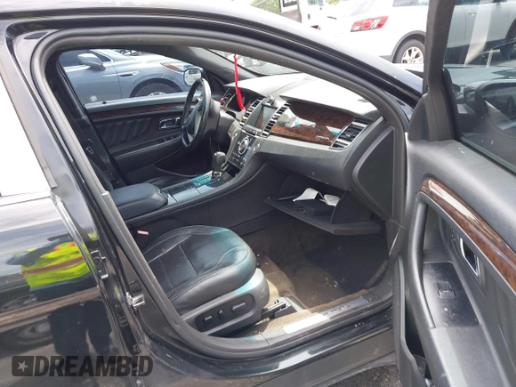 2013 Ford Taurus Limited with VIN 1FAHP2F84DG220283, listed as a IAAI auction lot 40045974 with 155,409 mi miles and . Bid and sale history available at DreamBid. Image 5.