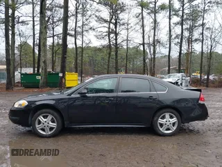 2015 Chevrolet Impala Limited Police Police with VIN 2G1WD5E30F1123396, listed as a IAAI auction lot 41357666 with 81,411 mi miles. Bid and sale history available at carsss.com. Image 14.