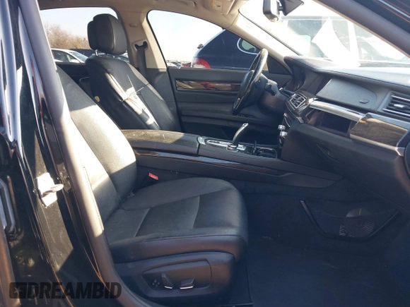 2013 BMW 7 Series 740i with VIN WBAYA6C55DC995094, listed as a IAAI auction lot 41246796 with 164,394 mi miles. Bid and sale history available at carsss.com. Image 5.