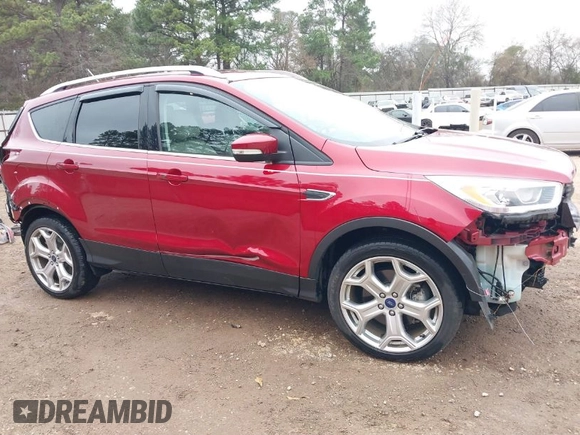 2017 Ford Escape Titanium with VIN 1FMCU0J94HUB01914, listed as a IAAI auction lot 41509707 with 55,827 mi miles. Bid and sale history available at carsss.com. Image 1.
